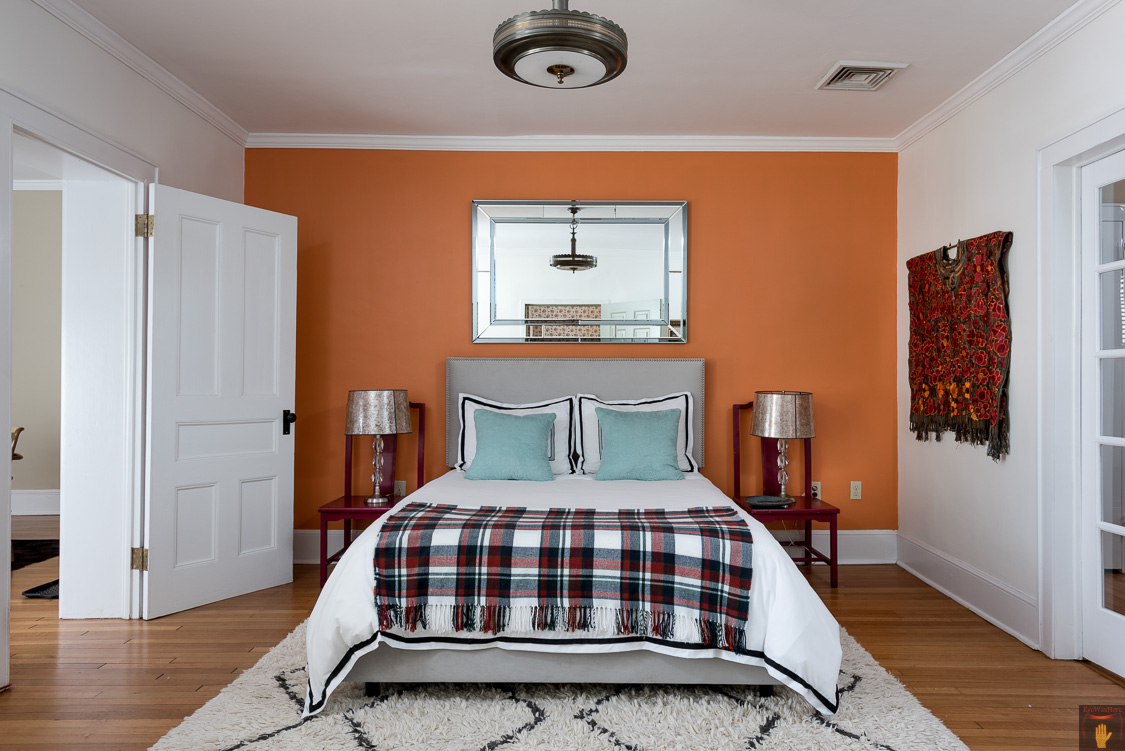 Hudson NY Vacation Rental Open Bedroom with an Orange Wall. Real Estate Photographer Dave Butterworth | EyeWasHere | Hudson New York Real Estate Photography